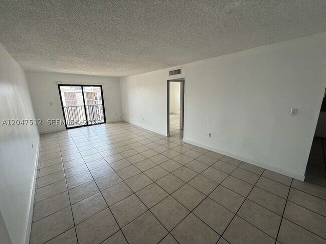 Building Photo - 6950 W 6th Ave Unit 509