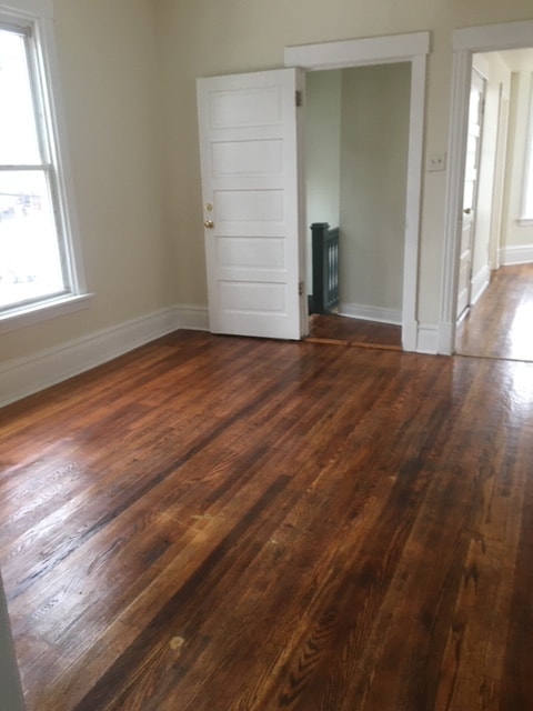 Living Room and Front Entrance - 6714 S Justine St Apartments Unit #2