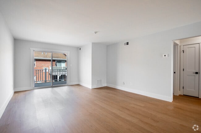 Renovated One Bedroom Living Room - Woodhull Gardens Apartments