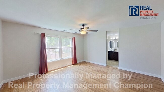 Photo - Charming home with open floor plan, vaulted ceilings and spacious backyard