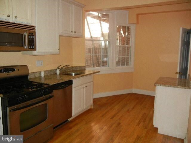 Kitchen - 101 W 39th St Unidad D1 Rental