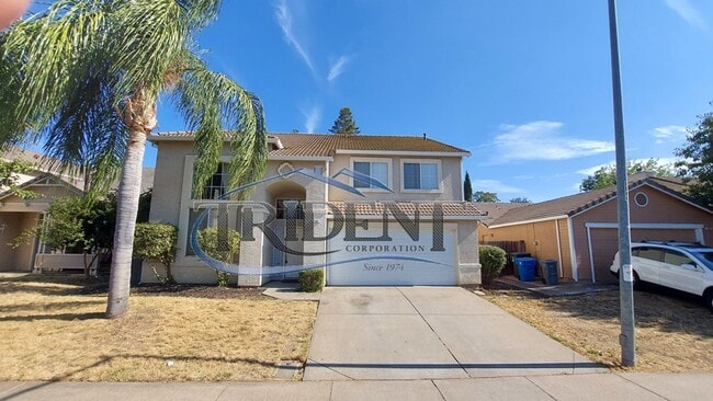 Building Photo - This is a large 4 bedroom, 3 bath SOLAR house with a bonus room upstairs