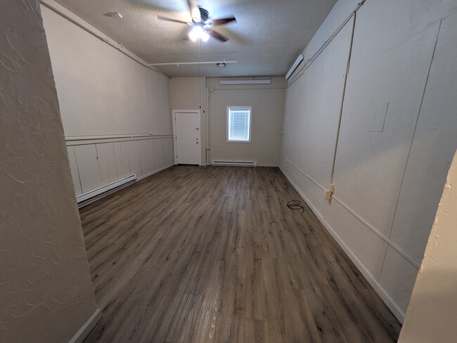 Unit 101 Living Area looking E - Lincoln Hotel Apartments