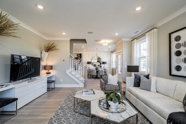 Photo - 3 Bedroom 2.5 Bathroom End Unit Townhome w/ 1st Floor Owners Suite and a 2 car Garage in the hear...