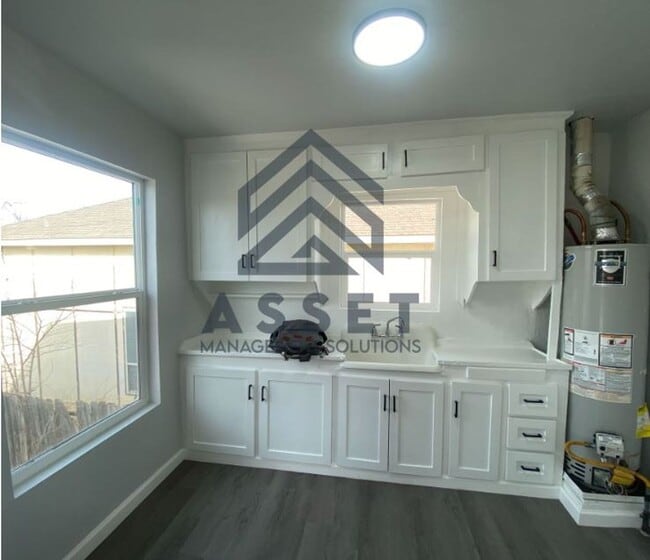 Photo - Modern 1-Bedroom Apartment with Thoughtful Design