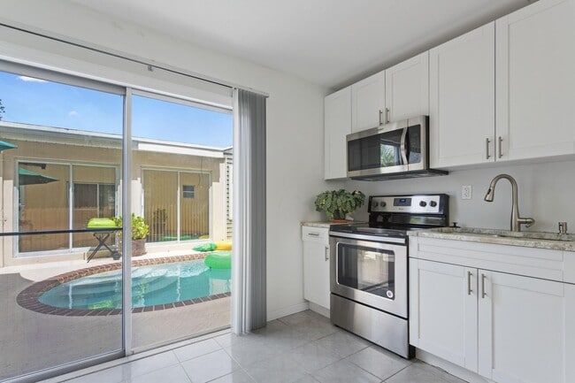 Photo - 216 Ocean Breeze Unit #1 Poolside