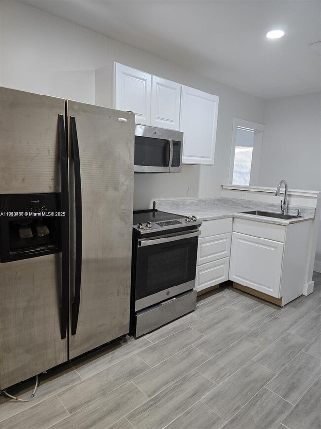 Building Photo - 1245 NE 110th Terrace Unit 2