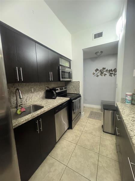 Building Photo - 7420 W 20th Ave Unit 246