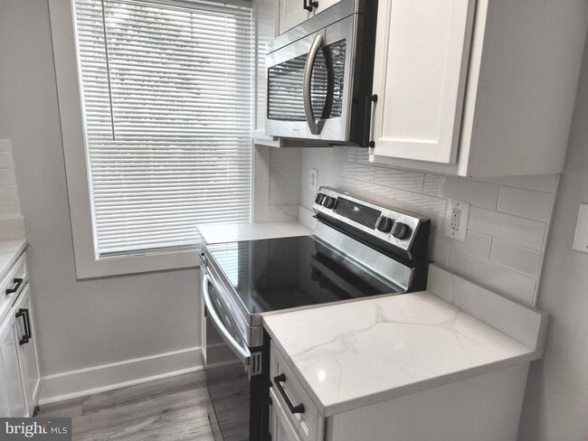 Building Photo - 3809 V St SE Unit 202 Rental