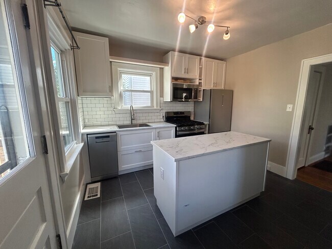 Newly Remodeled Kitchen with Stainless Steel Appliances, Island, Tiled Floors & Breakfast Nook - 4524 Orkney Ave Unit 1