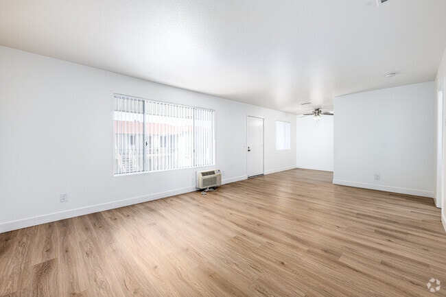 2BR, 1BA - 965SF - Living Room - Pioneer Plaza