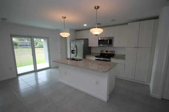Photo - Stunning 4BR/2BA Palm Bay Retreat with Modern Upgrades & Oversized Lot!!