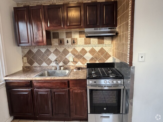 Building Photo - 1600 Murdoch Rd Unit 2 Rental