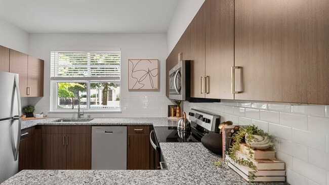 Modern open-concept layouts create a seamless flow between kitchen and living spaces