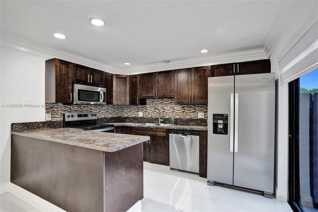 Photo - 7947 Tam Oshanter Blvd (North Lauderdale, FL)