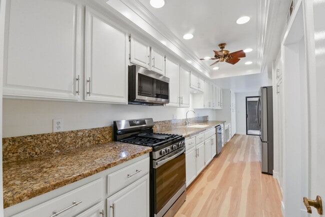 Photo - Beautiful four bedroom, three bath, townhouse available for rent. A must see.