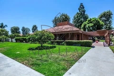 Building Photo - 6600 Warner Ave Rental