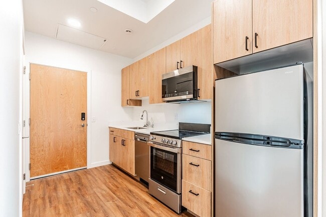 Photo - Atrium - Welcome to South Seattle’s Newest Modern Living Experience — Steps From the Light Rail