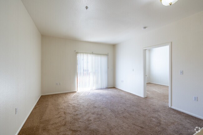 1BR, 1BA - 625SF - Living Room - The Village at Hampden Town Center