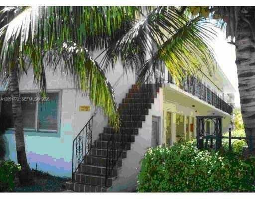Building Photo - 8132 Harding Ave Unit 9