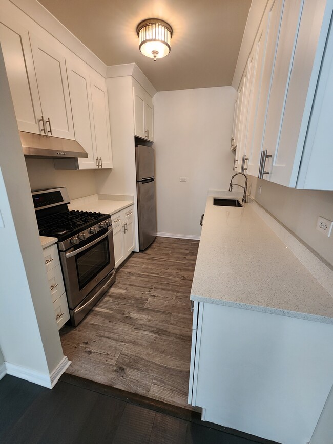 Kitchen - 1828 S Peoria St Unit 2 F