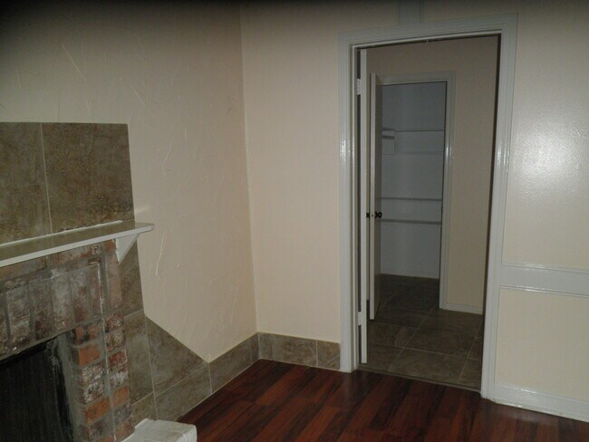 Fireplace, Washer/Dryer room with closet - 4702 Cashel Cir Unit D