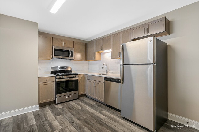 Building Photo - 6904 W Gunnison St Unit 1 Rental