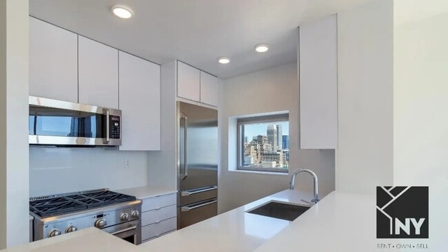 Photo - 102 W 27th St Unidad 14E