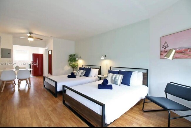 Building Photo - 7721 Harding Ave Unit 9