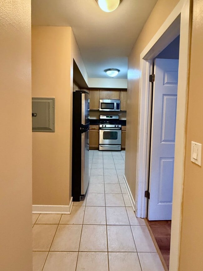 Photo - Pristine 2 Bedroom, 1 Bathroom Condo Available NOW! Heat, Water, & Parking INCLUDED in Rent! Unidad 1A