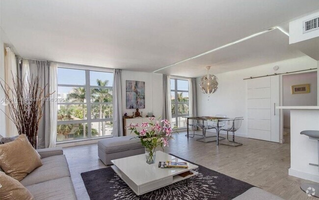 Building Photo - 9800 W Bay Harbor Dr Unit 407 Rental