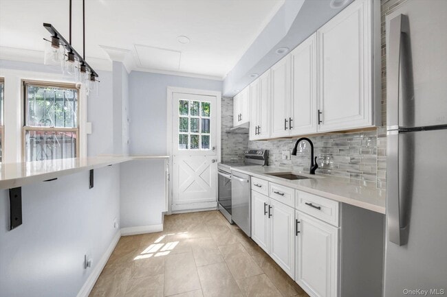 31-39 56th St