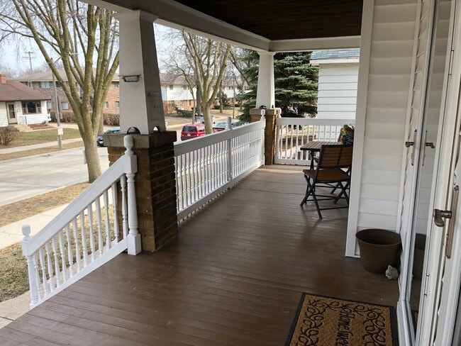 Beautiful front porch over looking the neighborhood. - 623 S 60th St
