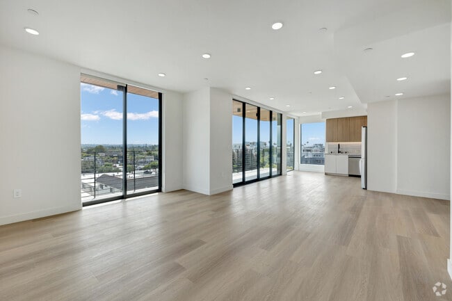 2BD, 2BA - 1,200SF - Living Room and Kitchen