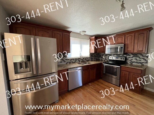 Photo - 5 Bedrooms & 2 Bathrooms walking distance to the Sheridan Light Rail Station!