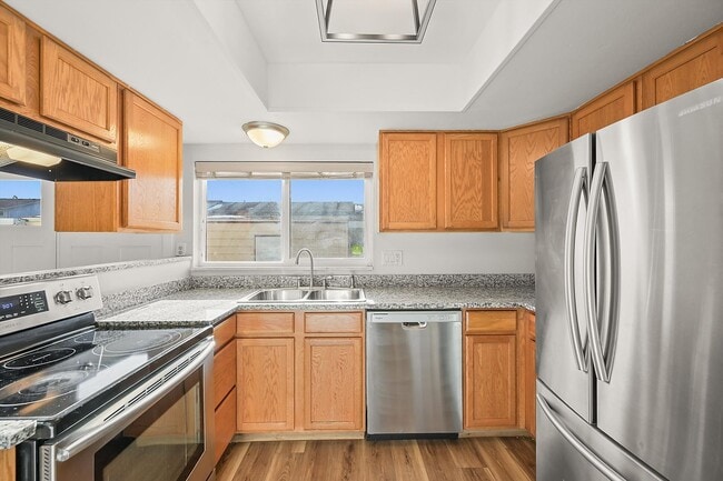 Photo - 3BR Townhome in Aurora | Private Yard, Covered Parking & Community Pool