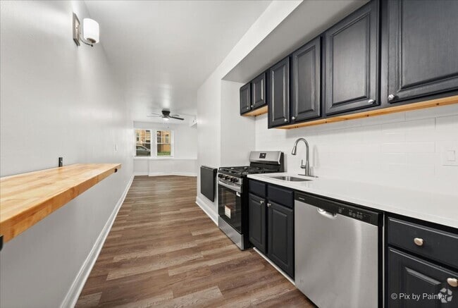 Building Photo - 5440 N Campbell Ave Unit Garden Rental