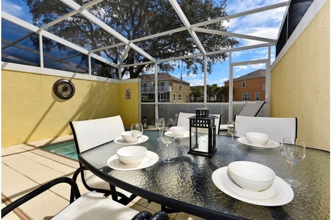 Photo - Modern Townhome in quiet neighborhood: 3BR, Pool & Near Disney