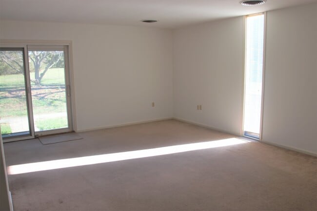 Spacious living room, open to the Dining Room. - 785 Radio Rd Unit 3