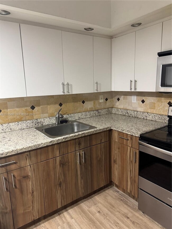 Photo - 8811 SW 132nd Pl Unit 401CW