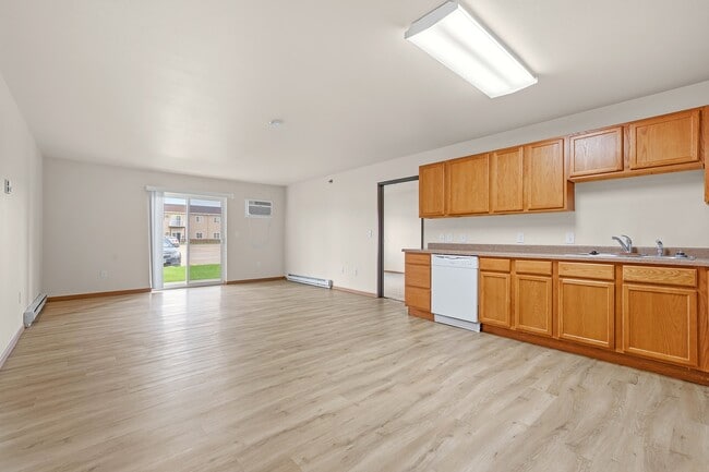 Step into the bright and spacious interiors of Paramount at the Bluffs Apartments, featuring modern finishes and an inviting layout. Perfect for comfortable living. Explore your future home today!
