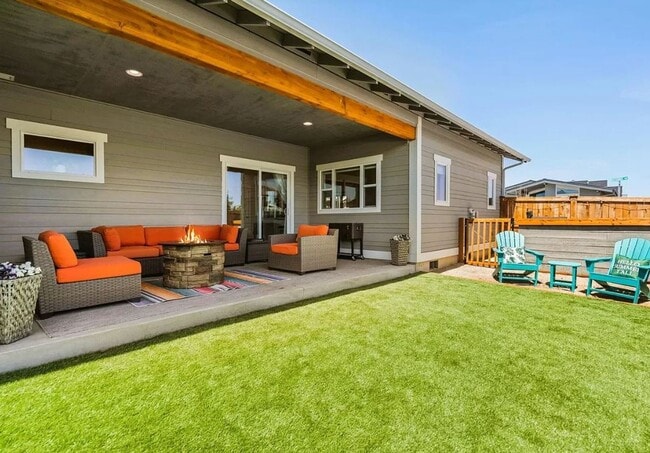 Photo - Furnished: New Modern Farmhouse Style Home with Abundant Light, Garage, Backyard. 30-day Min.