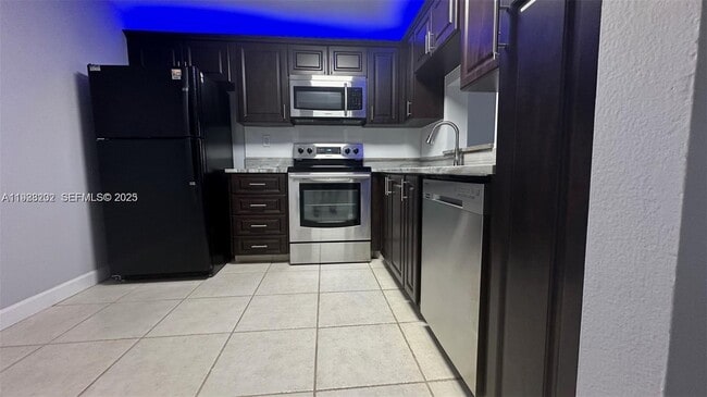 Building Photo - 6301 N University Dr Unit 219