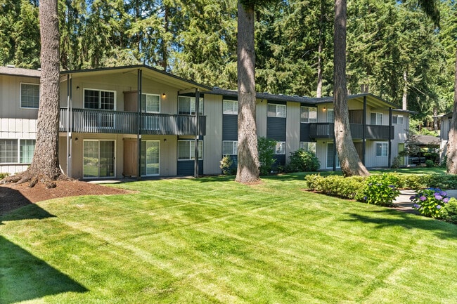 Experience tranquility in this beautiful apartment complex nestled amidst nature. - Chambers Pointe Apartments