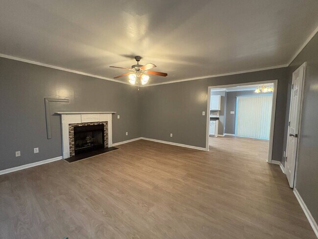 Photo - Spacious 4-Bedroom Sanctuary with Cozy Fireplace on Chimney Swift Drive!