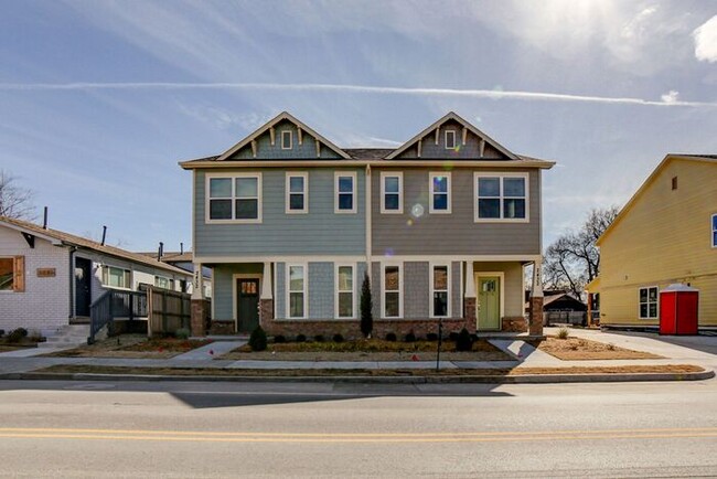 Building Photo - Move In Special! Luxury 4BR Townhome + Off...