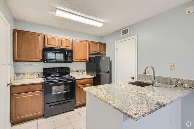 Building Photo - 4441 W McNab Rd Unit 27 Rental