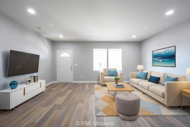 Building Photo - "Charming 3-Bedroom Duplex Oasis with 2 Fu... Unit A Rental