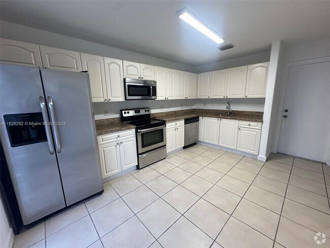 Building Photo - 7375 NW 173rd Dr Unit 52 Rental