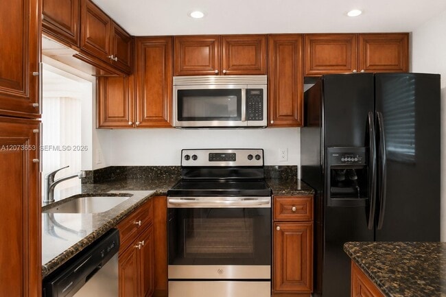 Building Photo - 9230 Lagoon Pl Unit 411